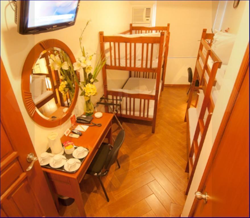 Avitel Hotel Makati City Номер фото
